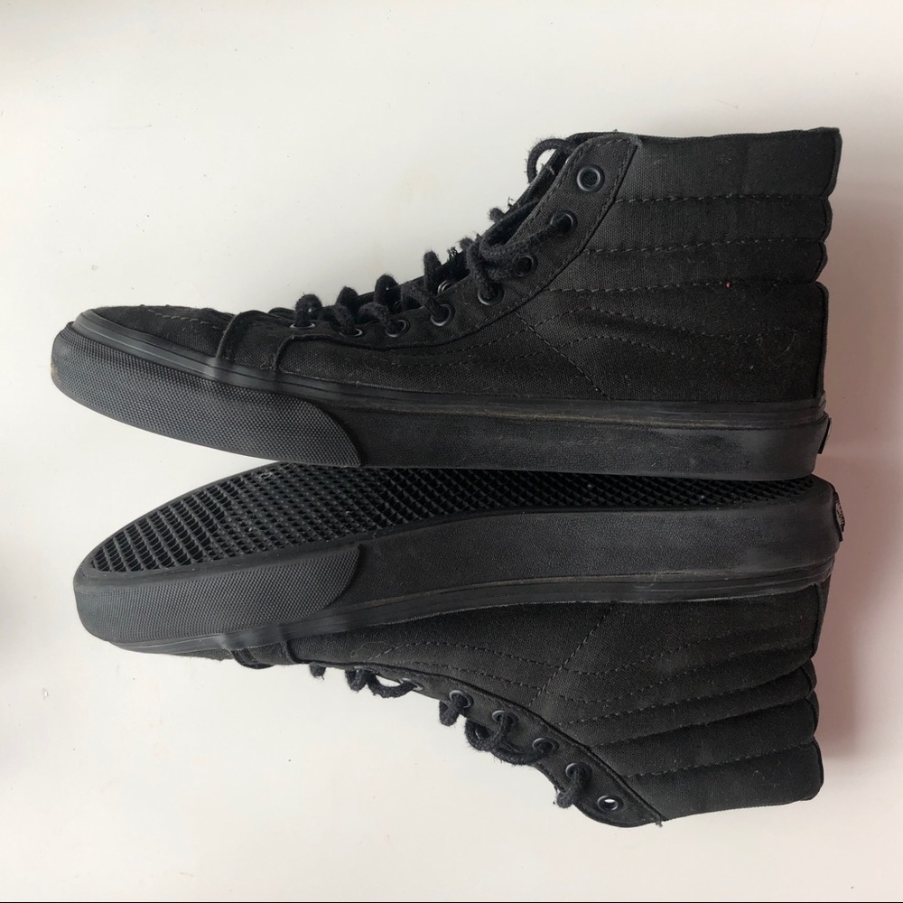 All black Vans high tops / sk8 high